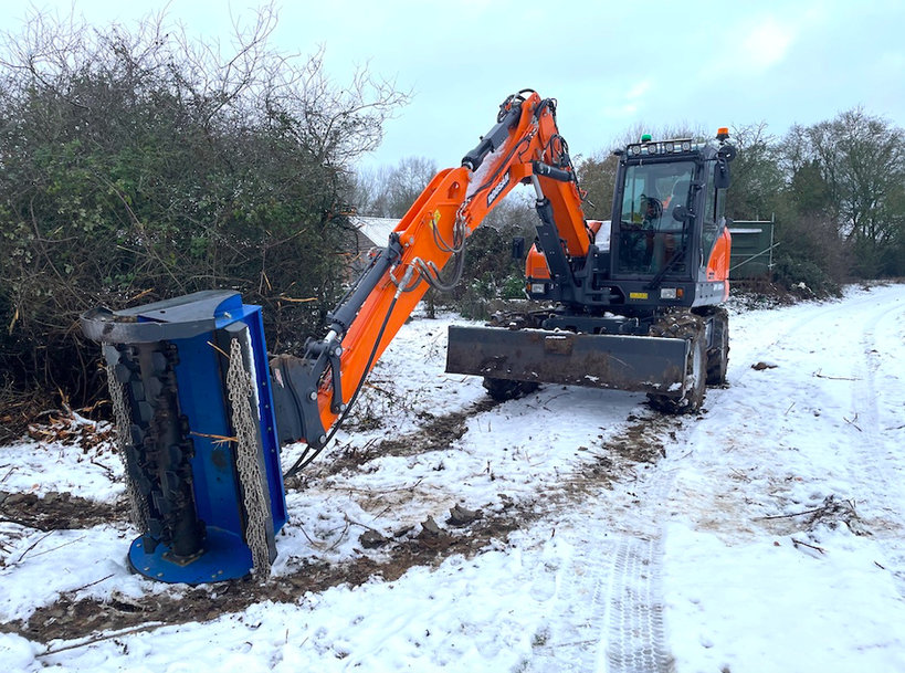 Contractor begins Next Phase With New Develon DX100W-7